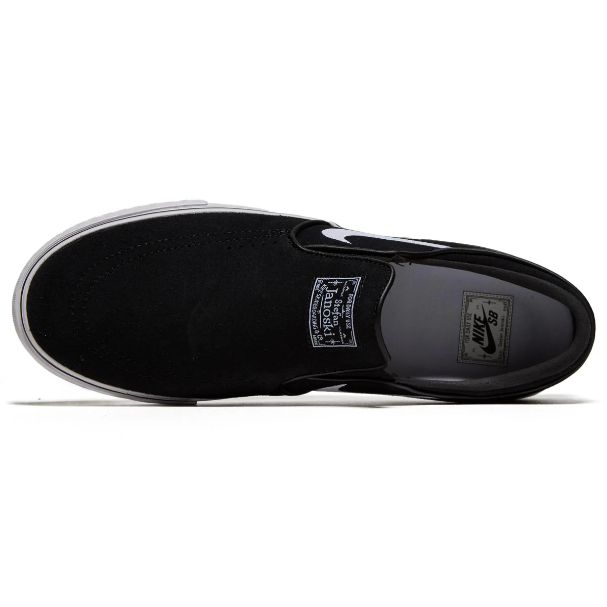 Nike sb janoski slip-on black and white skate shoes hot sale